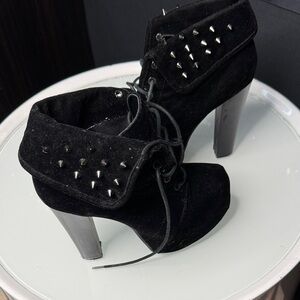 Elegant Black Heeled Boots with Stud Accents